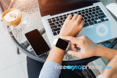 Woman Using Smart Watch In Coffee Shop, Modern City Lifestyle Stock Photo