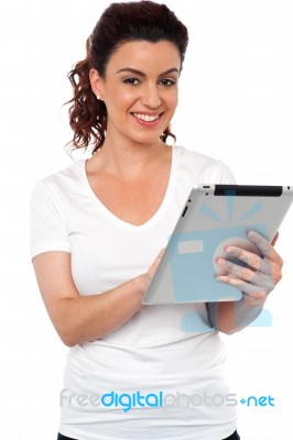 Woman Using Tablet Device Stock Photo