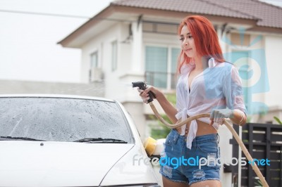 Woman Washing A Car Stock Photo