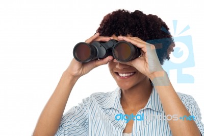 Woman Watching Through Binoculars Stock Photo