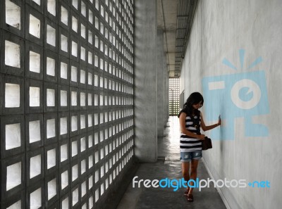 Woman With A Very Sad Expression In Dramatic Interior Stock Photo