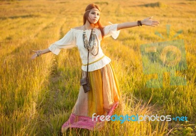 Woman With Arms Outstretched Stock Photo