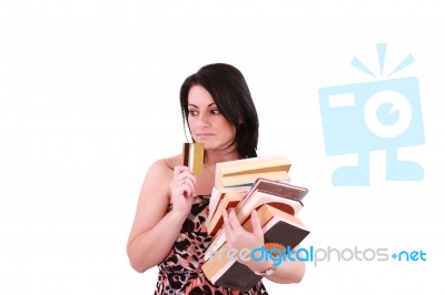 Woman With Credit Card And Books Stock Photo