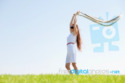 Woman With Flying Veil Stock Photo