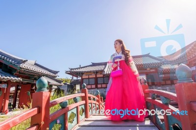 Woman With Hanbok In Gyeongbokgung,the Traditional Korean Dress Stock Photo