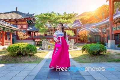 Woman With Hanbok In Gyeongbokgung,the Traditional Korean Dress Stock Photo