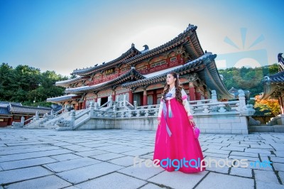 Woman With Hanbok In Gyeongbokgung,the Traditional Korean Dress Stock Photo