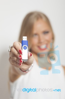 Woman With Information On Memory Stick Stock Photo