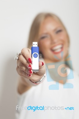 Woman With Information On Usb Memory Stock Photo