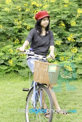 Woman With Retro Bicycle In A Park Stock Photo