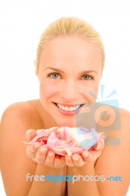 Woman With Rose Petals Stock Photo