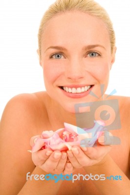 Woman With Rose Petals Stock Photo