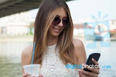 Woman With Smart Phone Stock Photo