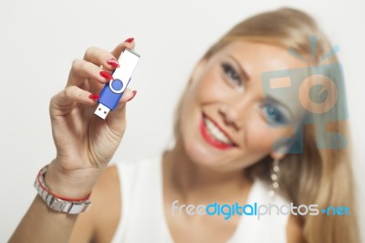 Woman With Usb Memory In Hands Stock Photo