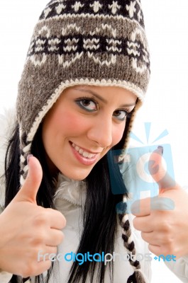 Woman With Woolen Cap And Thumbs Up Stock Photo