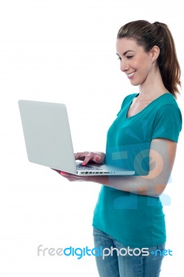 Woman Working On Her Laptop Stock Photo