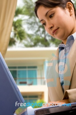 Woman Working Online From Home Stock Photo