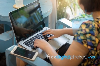 Woman Working With Laptop Computer Stock Photo