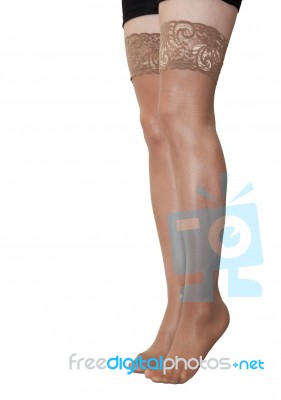 Woman's Legs In Nylon Stockings Stock Photo