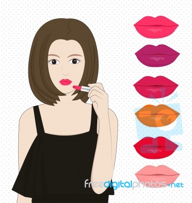 Women Applying Lipstick Stock Image