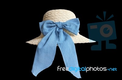 Women Brimmed Hat With Indigo Dye Ribbon Isolated On Black Background Stock Photo