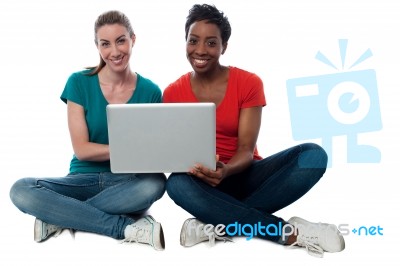 Women Browsing On Laptop Stock Photo