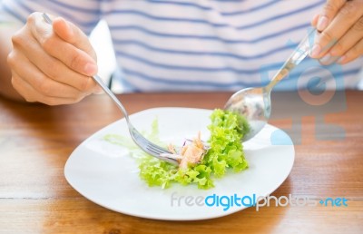 Women Eating Fresh Salad Stock Photo