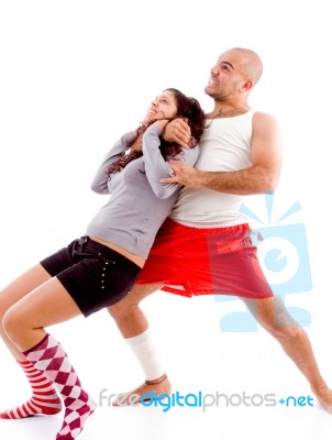 Women Fighting With Muscular Male Stock Photo