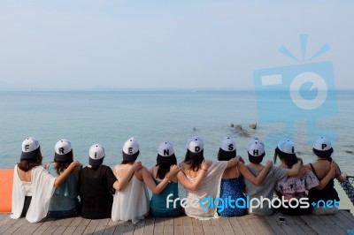 Women Friends Sit Hug Together Blue Sea Sky Stock Photo