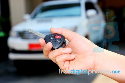 Women Hand Holding Car Key Stock Photo