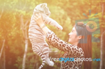 Women Hold Baby White Bengal Tiger Stock Photo