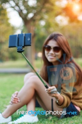 Women Hold Monopod Use Smart Phone Take Selfie Photography Stock Photo