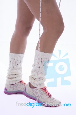 Women Legs And Jump Rope Stock Photo