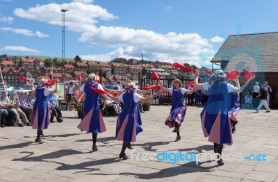 Women Morris Dancing In Whitby Stock Photo