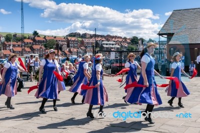 Women Morris Dancing In Whitby North Yorkshire Stock Photo