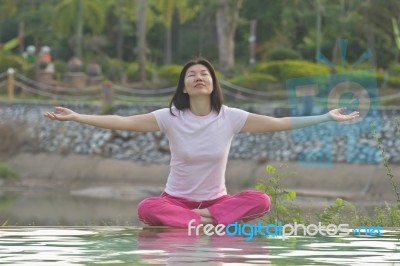 Women Practices Yoga Stock Photo