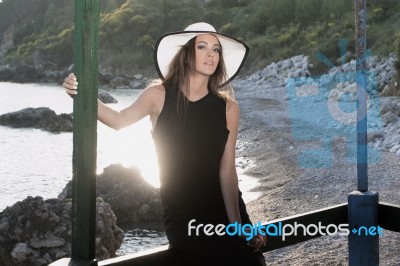 Women Relaxed On The Seashore Stock Photo