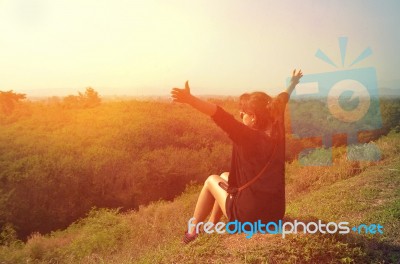 Women Relaxing Dna Happy On Hill Stock Photo