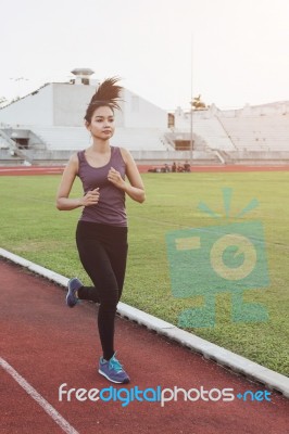 Women Runners Sprinting Outdoors. Healthy Lifestyle And Sport Co… Stock Photo