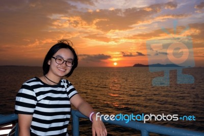 Women Tourist Cruising At Sunset Stock Photo