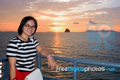 Women Tourist Cruising At Sunset Stock Photo