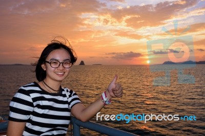 Women Tourist Cruising At Sunset Stock Photo