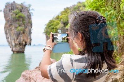 Women Tourist Shooting Natural View By Mobile Phone Stock Photo