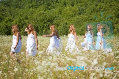 Women Walking Meadow Stock Photo