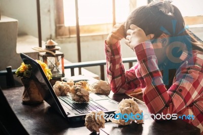 Women With Stressful On The Table Stock Photo