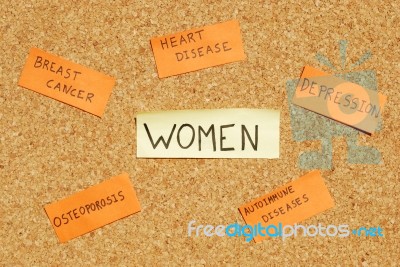 Women's Health Concerns On A Cork Board Stock Photo