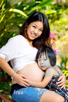 Wonderful Pregnant Woman And Her Children Stock Photo