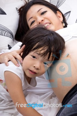 Wonderful Pregnant Woman And Her Children Stock Photo