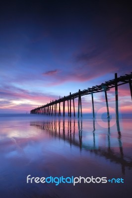 Wood Bridge In To Sea Stock Photo