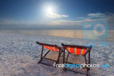 Wood Chairs Beach At Sea Side With Beautiful Sun Light On Clear Stock Photo